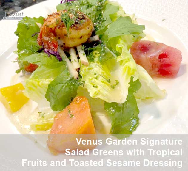 Venus Garden signature salad greens with tropical fruits and roasted prawn in toasted sesame dressing